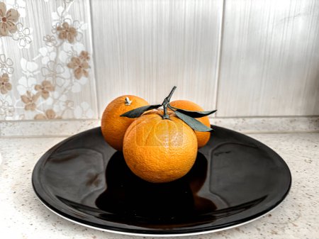 Photo for Solar vitamin: Oranges on a dark background - Royalty Free Image