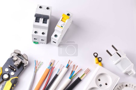 Electric tools set with dimmer switch isolated on white background with copy space, controllable lighting. Saving energy concept, building and renovation