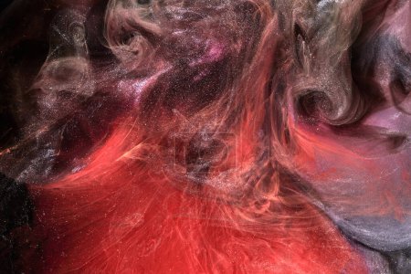 Téléchargez les photos : Fond abstrait à l'encre rouge noire. Peinture acrylique toile de fond pour parfum, narguilé, cosmétiques. Mystérieux nuages de fumée, brouillard coloré - en image libre de droit