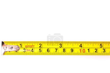 Photo for Yellow carpenter measuring tape with centimeters isolated on white background. Construction tool. - Royalty Free Image