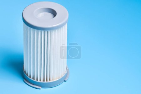 Photo for New clean dust air filters for vacuum cleaner isolated on blue background - Royalty Free Image