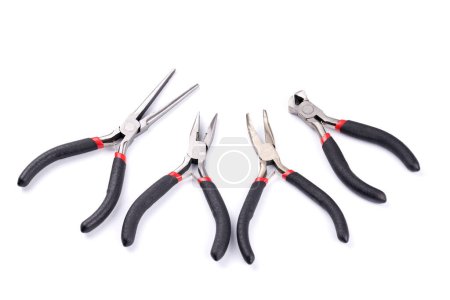 Photo for Set of different types of pliers and side cutters isolated on white background. Hand tools for repair, construction and maintenance - Royalty Free Image