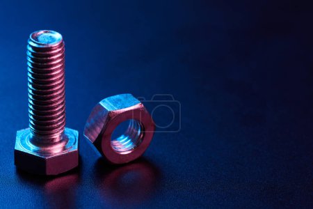 Photo for Set of bolts nuts nails metal fasteners. Consumable hardware tools. assortment steel screws collection close up background - Royalty Free Image