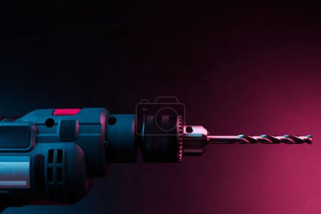 Photo for New drill closeup isolated on black background, power tools concept - Royalty Free Image