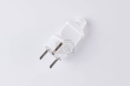 Photo for Electric European white plug for socket isolated on white background - Royalty Free Image