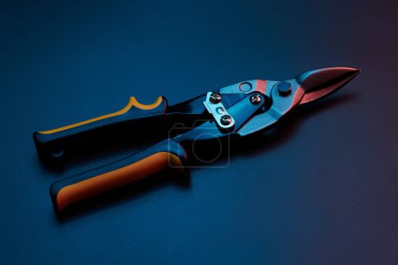 Photo for Scissors for cutting metal closeup isolated on black background - Royalty Free Image