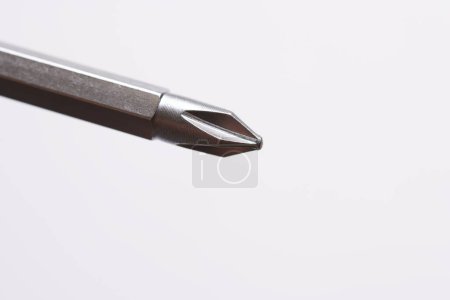 Foto de Nozzle for screwdriver, attachment bit close-up isolated on white background - Imagen libre de derechos