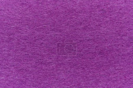 Téléchargez les photos : Soft felt textile material royal purple colors, colorful texture flap fabric background closeup - en image libre de droit