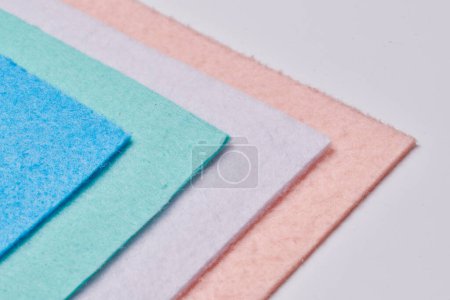 Photo for Multi-colored soft felt textile material, colorful patchwork texture fabric close-up - Royalty Free Image