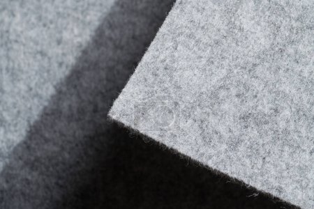 Foto de Soft felt textile material gray color, colorful texture flap fabric background closeup - Imagen libre de derechos