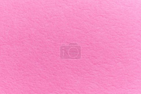 Foto de Soft felt textile material pink color, colorful texture flap fabric background closeup - Imagen libre de derechos