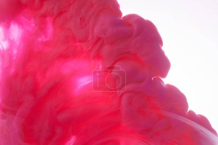 Photo for Gentle Pink abstract ocean background. Splashes, drops and waves of paint under water, clouds of smoke in motion - Royalty Free Image