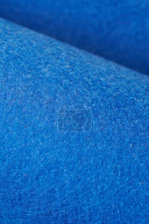 Foto de Soft felt textile material blue color, colorful texture flap fabric background closeup - Imagen libre de derechos