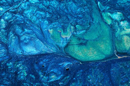 Foto de Luxury abstract background, liquid art. Blue alcohol ink with golden paint streaks, water surface, marble texture - Imagen libre de derechos