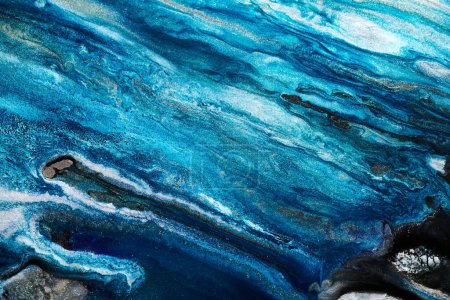 Foto de Luxury abstract background, liquid art. Blue alcohol ink with golden paint streaks, water surface, marble texture - Imagen libre de derechos
