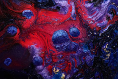 Téléchargez les photos : Luxury abstract background, liquid art. Blue red mix alcohol ink with golden paint blots, Earth water surface, marble texture - en image libre de droit