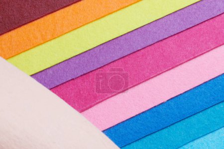 Photo for Multi-colored soft felt textile material, colorful patchwork texture fabric close-up - Royalty Free Image