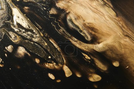 Foto de Fondo abstracto de lujo, arte líquido. Mezcla de pintura de oro negro, manchas de tinta de alcohol, textura de mármol. Patrón de impresión moderna - Imagen libre de derechos