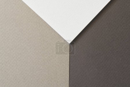 Foto de Fondo de papel kraft áspero, textura de papel diferentes tonos de gris negro. Mockup con espacio de copia para texto - Imagen libre de derechos