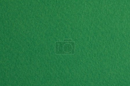 Photo for Rough kraft paper background, monochrome paper texture rich green color. Mockup with copy space for text - Royalty Free Image