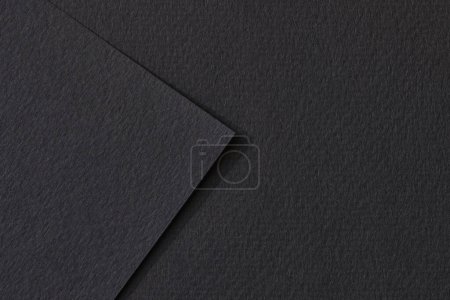 Photo for Rough kraft paper pieces background, geometric monochrome paper texture black color. Mockup with copy space for text - Royalty Free Image