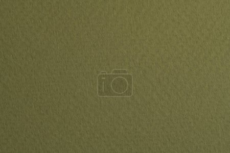 Foto de Fondo de papel kraft áspero, textura de papel monocromo de color verde oscuro. Mockup con espacio de copia para texto - Imagen libre de derechos