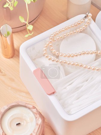 Photo for White plastic organizer for cosmetic products , makeup stuff and accessories, beauty room interior - Royalty Free Image