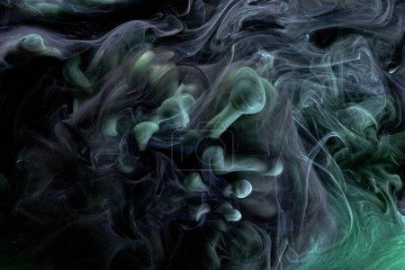 Photo for Green black contrast liquid art background. Paint ink explosion, abstract clouds of smoke mock-up, watercolor underwater - Royalty Free Image
