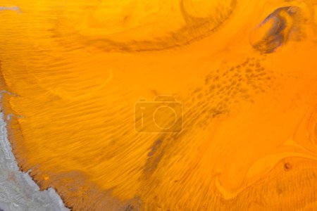 Photo for Abstract creative background liquid art, contrast paint stains and blots, orange alcohol ink - Royalty Free Image