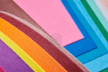 Foto de Multi-colored soft felt textile material, colorful patchwork texture fabric close-up - Imagen libre de derechos