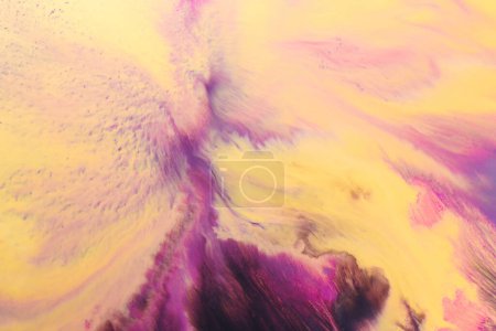 Photo for Abstract creative background liquid art, contrast paint stains and blots, yellow purple alcohol ink - Royalty Free Image