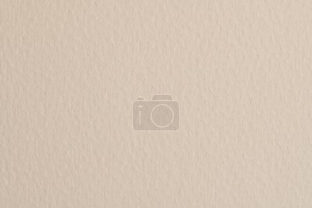 Foto de Fondo de papel kraft áspero, textura de papel monocromo color beige. Mockup con espacio de copia para texto - Imagen libre de derechos