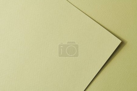 Photo for Rough kraft paper pieces background, geometric monochrome paper texture pale green color. Mockup with copy space for text - Royalty Free Image