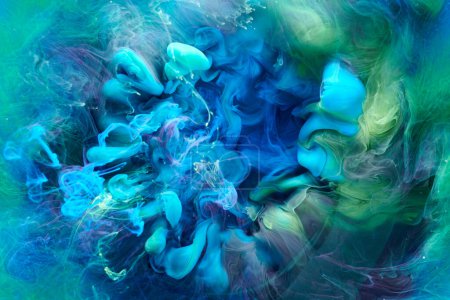 Zielony niebieski kolor abstrakcyjne tło dymu. Mieszać tusz alkoholowy, kreatywny ciecz sztuka makieta z kopia przestrzeń. Fale farb akrylowych pod wodą