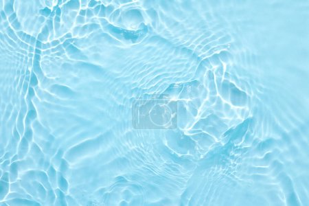Photo for Water blue surface abstract background. Waves and ripples of cosmetic moisturizer with bubbles - Royalty Free Image
