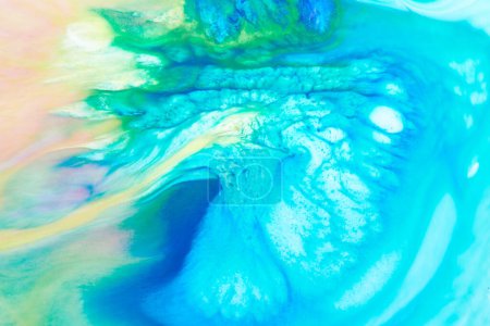 Foto de Arte líquido de fondo abstracto, textura de mármol multicolor, manchas y manchas de pintura, tinta de alcohol azul - Imagen libre de derechos