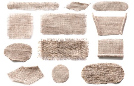 Foto de Conjunto de piezas de lino aisladas cortadas sobre fondo blanco con espacio para copiar. Muestras de tela mocku - Imagen libre de derechos