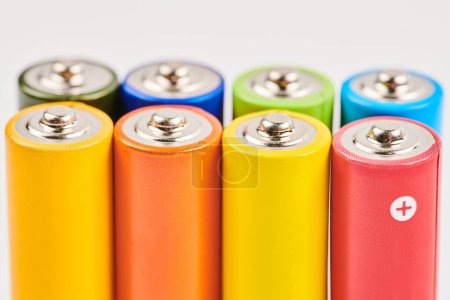 Photo for Colorful alkaline AAA batteries closeup isolated on white background - Royalty Free Image