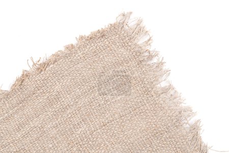 Foto de Pieza de lino sin teñir aislada sobre fondo blanco con espacio para copiar. maqueta de muestra de tela - Imagen libre de derechos