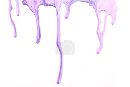 Photo for Paint drops flowing down on white paper. Lilac purple ink blots abstract background - Royalty Free Image