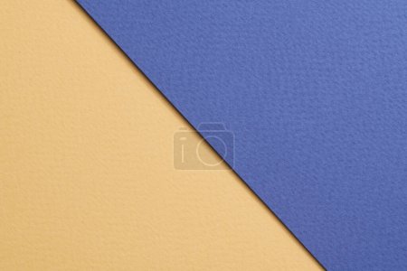 Téléchargez les photos : Rough kraft paper background, paper texture beige blue colors. Mockup with copy space for tex - en image libre de droit