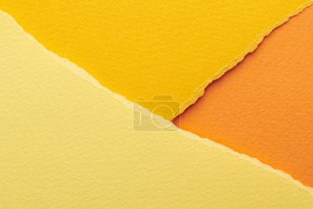 Photo for Art collage of pieces of ripped paper with torn edges. Sticky notes collection yellow orange colors, shreds of notebook pages. Abstract backgroun - Royalty Free Image