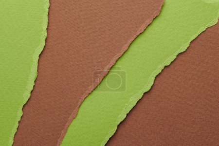 Photo for Art collage of pieces of ripped paper with torn edges. Sticky notes collection green brown colors, shreds of notebook pages. Abstract backgroun - Royalty Free Image