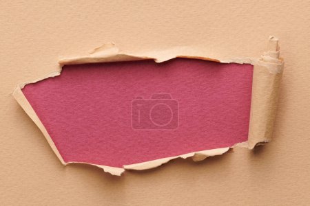 Photo for Frame of ripped paper with torn edges. Window for text with copy space red burgundy beige colors, shreds of notebook pages. Abstract backgroun - Royalty Free Image