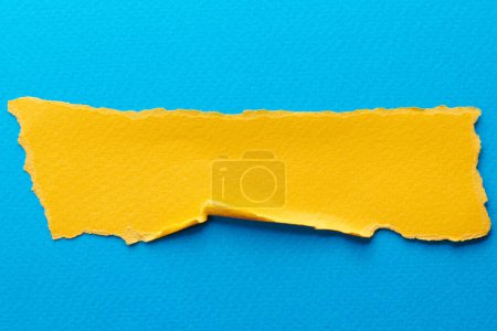 Photo for Art collage of pieces of ripped paper with torn edges. Sticky notes collection yellow blue colors, shreds of notebook pages. Abstract backgroun - Royalty Free Image