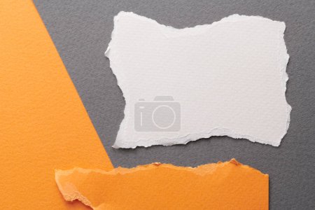 Photo for Art collage of pieces of ripped paper with torn edges. Sticky notes collection orange gray white colors, shreds of notebook pages. Abstract backgroun - Royalty Free Image