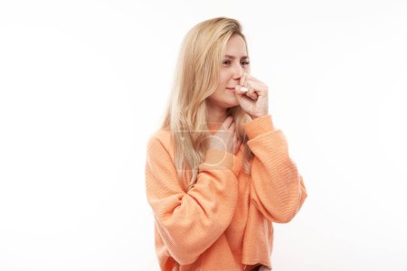 Photo for Portrait of young blond woman coughing, suffering from sore throat isolated on white studio background. Respiratory disease concept - Royalty Free Image