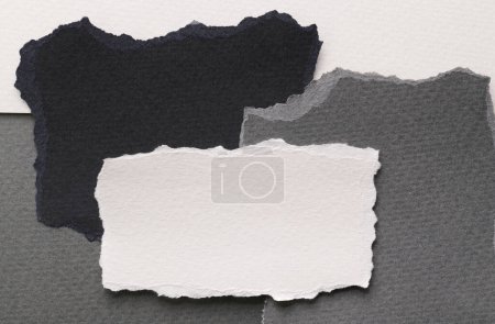Photo for Art collage of pieces of ripped paper with torn edges. Sticky notes collection black gray white colors, shreds of notebook pages. Abstract backgroun - Royalty Free Image