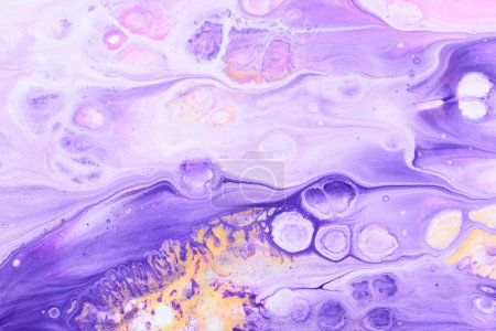 Photo for Exclusive beautiful pattern, abstract fluid art background. Flow of blending purple lilac yellow paints mixing together. Blots and streaks of ink texture for print and design - Royalty Free Image