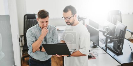 Photo for Portrait of two professional male programmers working on computer in diverse offices. Modern IT technologies, development of artificial intelligence, programs, applications and video games concept - Royalty Free Image